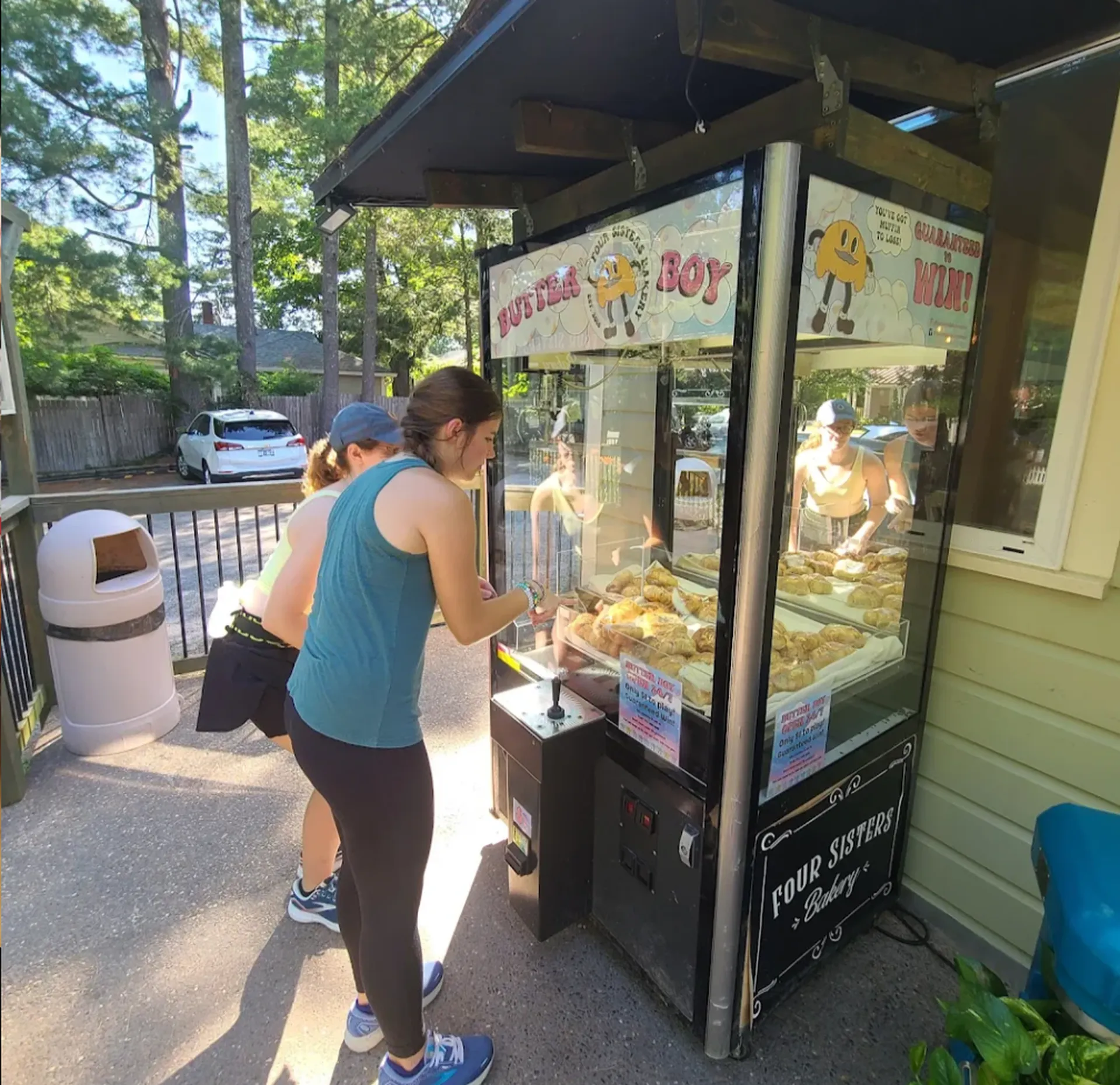 Customer playing the Butter Boy claw machine